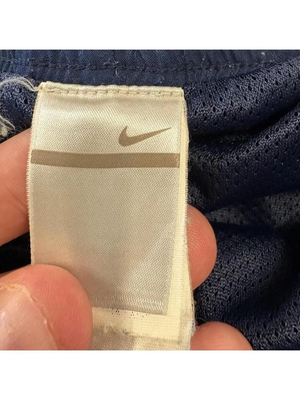 Super fire vintage early 2000s Nike grey tag swim trunks.